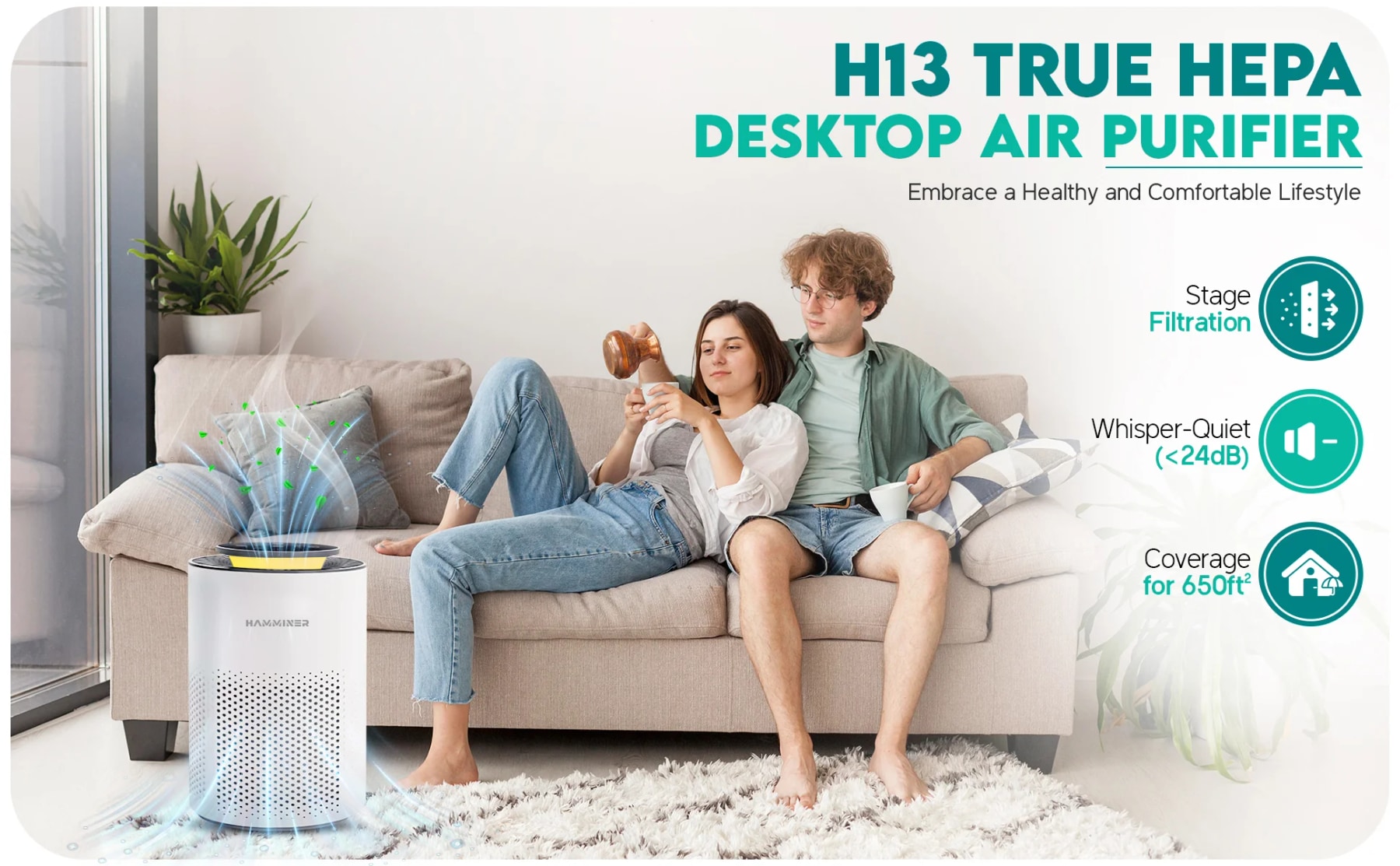 White H13 HEPA air purifier beside a sofa with a couple relaxing in the living room.